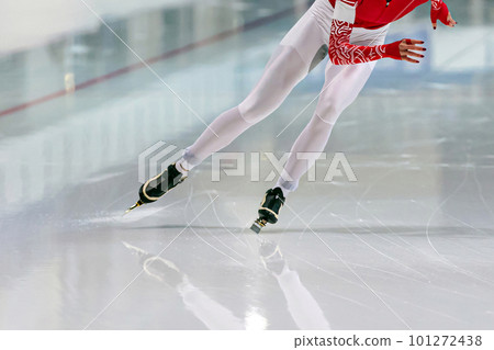 slim female skaters run race in speed skating competition, winter sports games 101272438