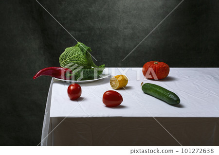 Still life with Savoy cabbage, tomatoes, cucumber, red pepper, lemon and pumpkin 101272638