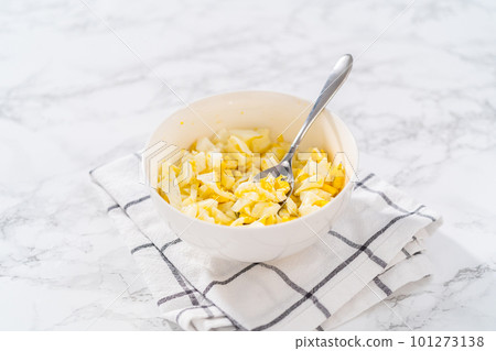 Chopped hard-boiled eggs in a white ceramic bowl. Chopped hard-boiled eggs in a white ceramic bowl. 101273138