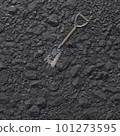 Coal mineral black cube stone background. Coal bunker. Metal shovel with a wooden handle for working with coal. 3D-rendering 101273595