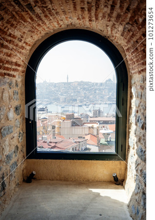 Cityscape of Istanbul through the ancient window of Galata Tower, Turkey 101273654