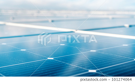 Multiple solar panels on the roof of a manufacturing building 101274064