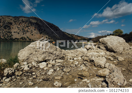 Kournas Mountain Lake in Greece. Cozy summer day and calm water in the lake 101274233