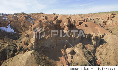 Charyn Grand Canyon with orange rock walls. Almaty 101274353