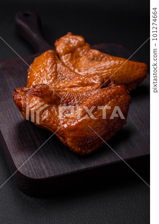 Delicious grilled chicken wings with spices and herbs Delicious grilled chicken wings with spices and herbs 101274664