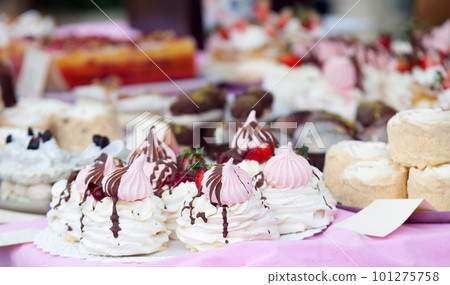 Many tasty desserts on tbale of local confectionery at Prague street market 101275758