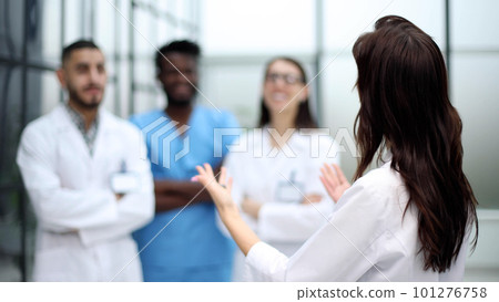 Group of medicine doctors talking during conference Group of medicine doctors talking during conference 101276758