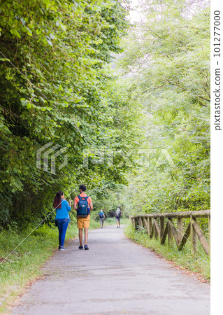 Unrecognizable mixed race mid couple ecotourism hiking in senda del oso, Asturias conservation Unrecognizable mixed race mid couple ecotourism hiking in senda del oso, Asturias conservation 101277000