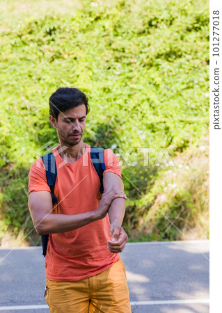 Sunblock bodycare lotion for summertime. Unrecognizable mid man closeup ultraviolet rays protection Sunblock bodycare lotion for summertime. Unrecognizable mid man closeup ultraviolet rays protection 101277018