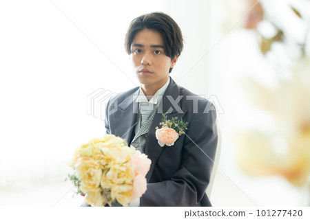 Male groom in a tuxedo 101277420