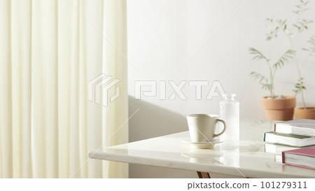 A room with a calm atmosphere, with clay pots placed in front of the wall and curtains letting in natural light. Glass bottles, coffee, and various objects on a marble table 101279311