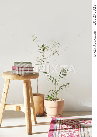 A room with a calm atmosphere, with clay pots placed in front of the wall and curtains letting in natural light. Glass bottles, coffee, and various objects on a marble table A room with a calm atmosphere, with clay pots placed in front of the wall and curtains letting in natural light. Glass bottles, coffee, and various objects on a marble table 101279328