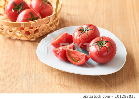 Fruit tomatoes on a plate Fruit tomatoes on a plate 101282835