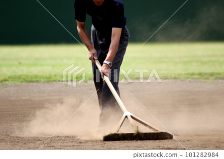 Baseball field ground maintenance 101282984