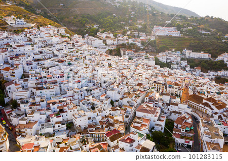 Mountain landscape with Spanish town of Competa on slopes 101283115