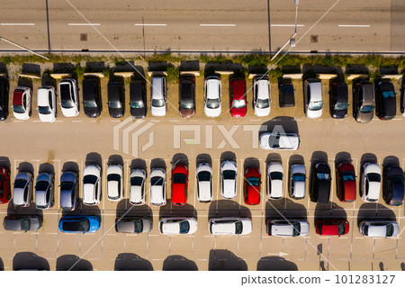 Top view of wide road with markings and lots of cars at day 101283127