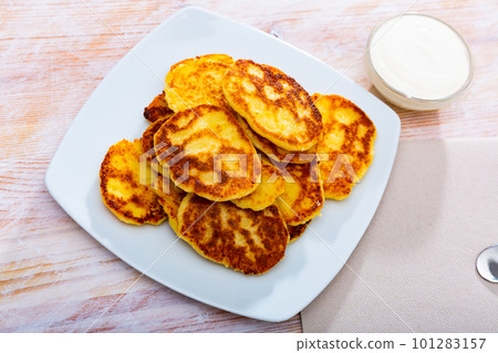 Cottage cheese pancakes, russian cuisine Cottage cheese pancakes, russian cuisine 101283157