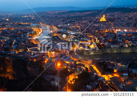 Night aerial view of Tbilisi city with Kura river 101283315