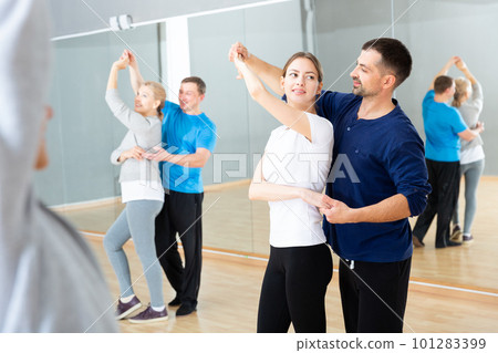 People practicing bachata movements 101283399