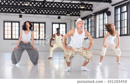 dancers training in a dance studio 101283459