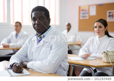 African american doctor on lecture within refresher course 101283489
