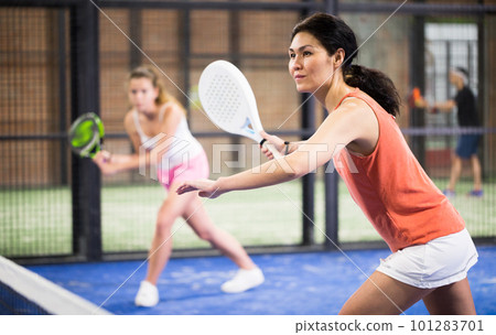Asian girl with passion play padel closeup 101283701