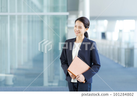 Image of a business woman in a suit Image of a business woman in a suit 101284802