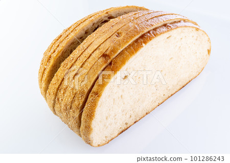 bread sliced on a white background with reflection 101286243