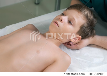 Session of craniosacral therapy, cure of teen boy's neck by a doctor therapist. 101290903