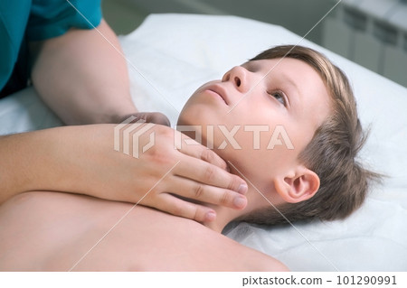 Session of craniosacral therapy, cure of teen boy's jaw by a doctor therapist. 101290991