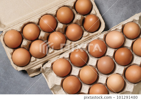 Top view of eggs in a cardboard box ready for breakfast Top view of eggs in a cardboard box ready for breakfast 101291480