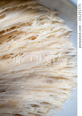 Close up sourdough bread dough starter texture, baking homemade bread. Close up sourdough bread dough starter texture, baking homemade bread. 101291775
