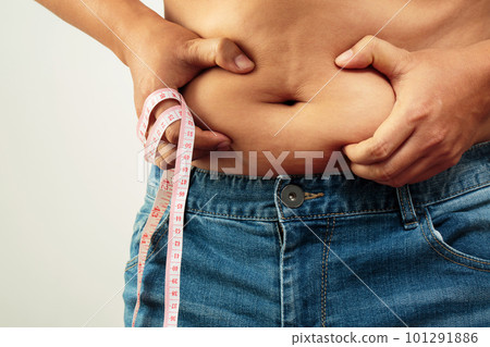 fat man check out body overweight abdomen his belly with in hand measuring tape fat man check out body overweight abdomen his belly with in hand measuring tape 101291886