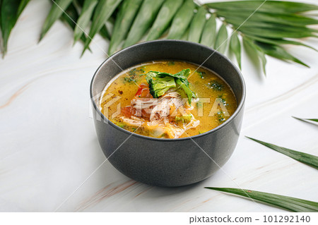 Portion of thai soup tom kha with chicken Portion of thai soup tom kha with chicken 101292140