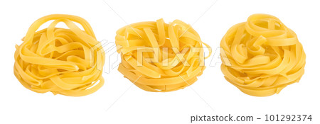 Raw tagliatelle pasta isolated on white background with full depth of field. Set or collection 101292374