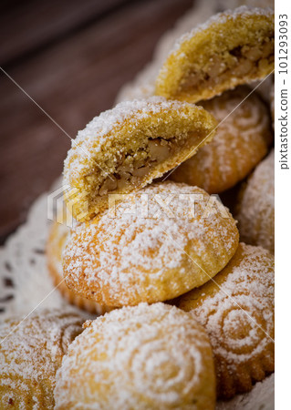 Traditional eid maamoul or mamoul cookies with dates, nuts, and jam, Arabic sweets for Aid al-Fitr Traditional eid maamoul or mamoul cookies with dates, nuts, and jam, Arabic sweets for Aid al-Fitr 101293093