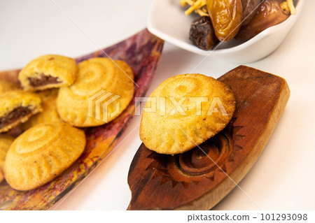 Traditional eid maamoul or mamoul cookies with dates, nuts, and jam, Arabic sweets for Aid al-Fitr Traditional eid maamoul or mamoul cookies with dates, nuts, and jam, Arabic sweets for Aid al-Fitr 101293098