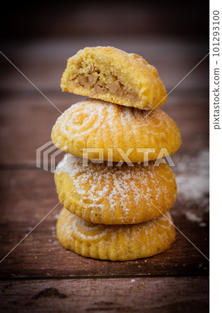 Traditional eid maamoul or mamoul cookies with dates, nuts, and jam, Arabic sweets for Aid al-Fitr Traditional eid maamoul or mamoul cookies with dates, nuts, and jam, Arabic sweets for Aid al-Fitr 101293100