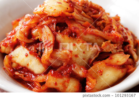 Spicy Chinese cabbage kimchi served on a white plate 101293167