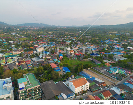 Aerial view of residential neighborhood roofs with nature forest trees. Urban housing development from above. Top view. Real estate in Bangkok City, Thailand. Local property real estate. Aerial view of residential neighborhood roofs with nature forest trees. Urban housing development from above. Top view. Real estate in Bangkok City, Thailand. Local property real estate. 101293248