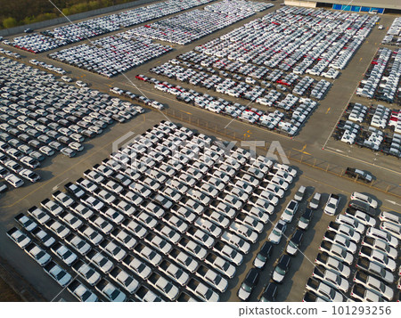 Aerial top view of new cars parking for sale stock lot row, dealer inventory import and export business commercial worldwide, Automobile and automotive industry distribution logistic global transport 101293256
