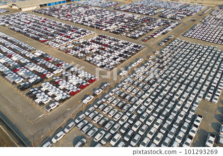 Aerial top view of new cars parking for sale stock lot row, dealer inventory import and export business commercial worldwide, Automobile and automotive industry distribution logistic global transport 101293269