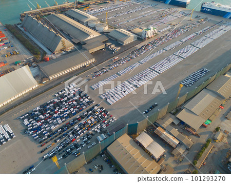 Aerial top view of new cars parking for sale stock lot row, dealer inventory import and export business commercial worldwide, Automobile and automotive industry distribution logistic global transport 101293270