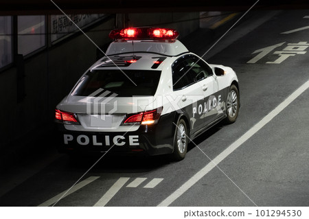 Police car driving image 101294530