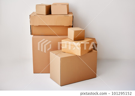 Heap of cardboard boxes on white backround Heap of cardboard boxes on white backround 101295152