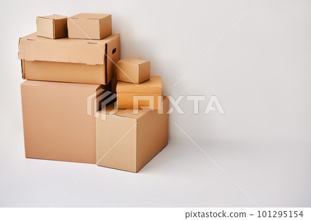 Heap of cardboard boxes on white backround Heap of cardboard boxes on white backround 101295154
