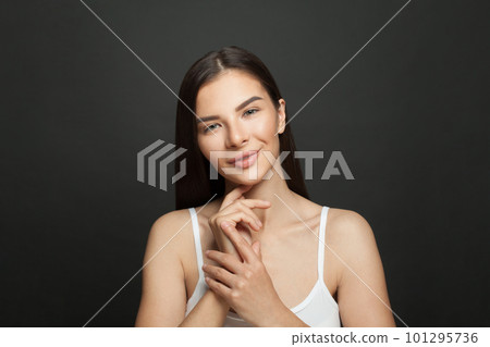 Cheerful model woman with clean skin portrait 101295736