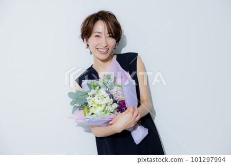 A woman with short hair A woman with short hair 101297994