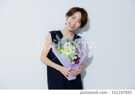 A woman with short hair A woman with short hair 101297995