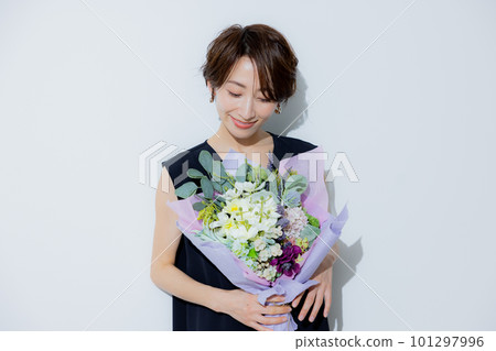 A woman with short hair A woman with short hair 101297996